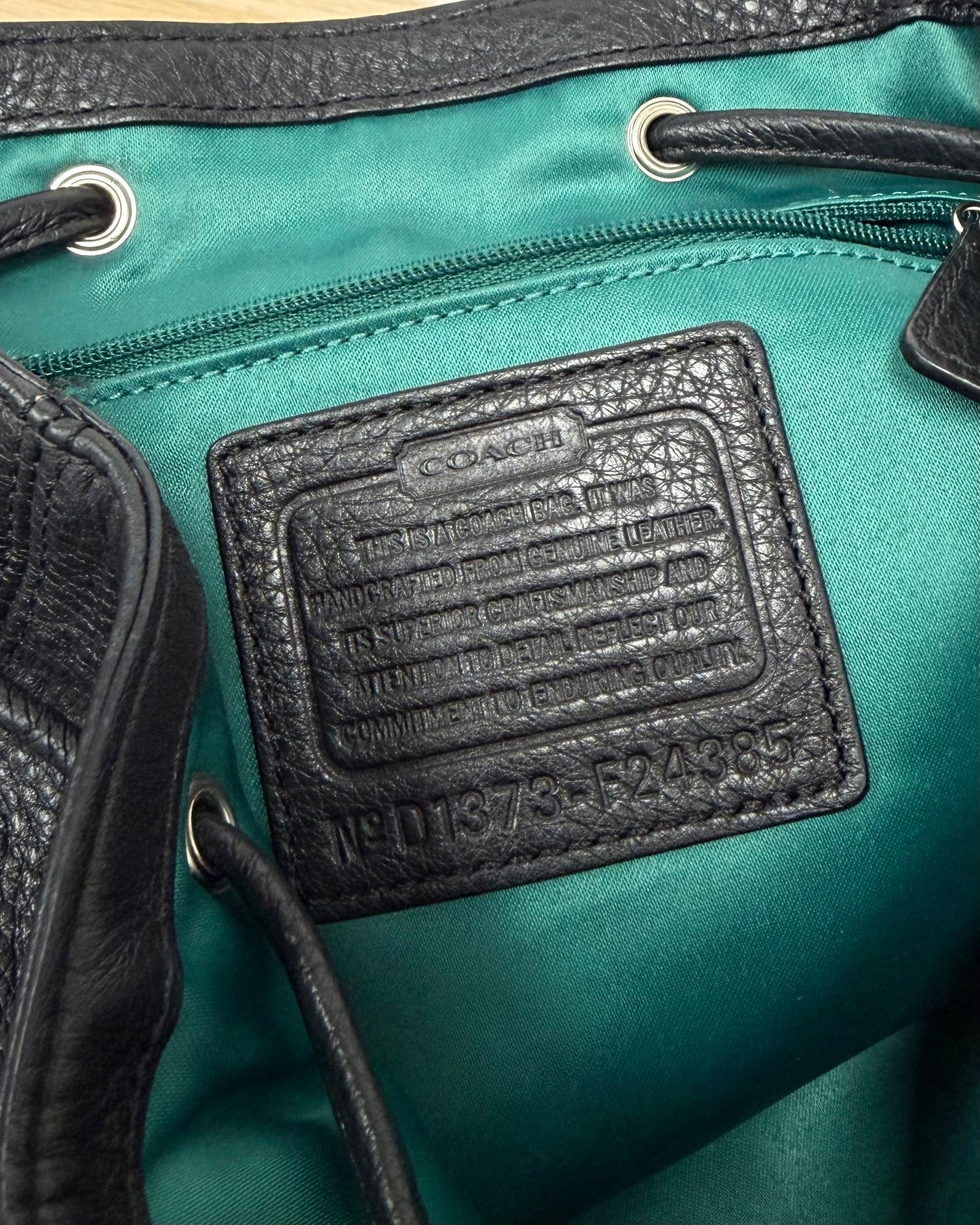 Black Leather Coach backpack