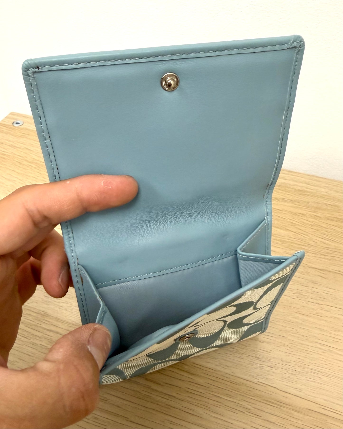 Light blue Coach bifold wallet