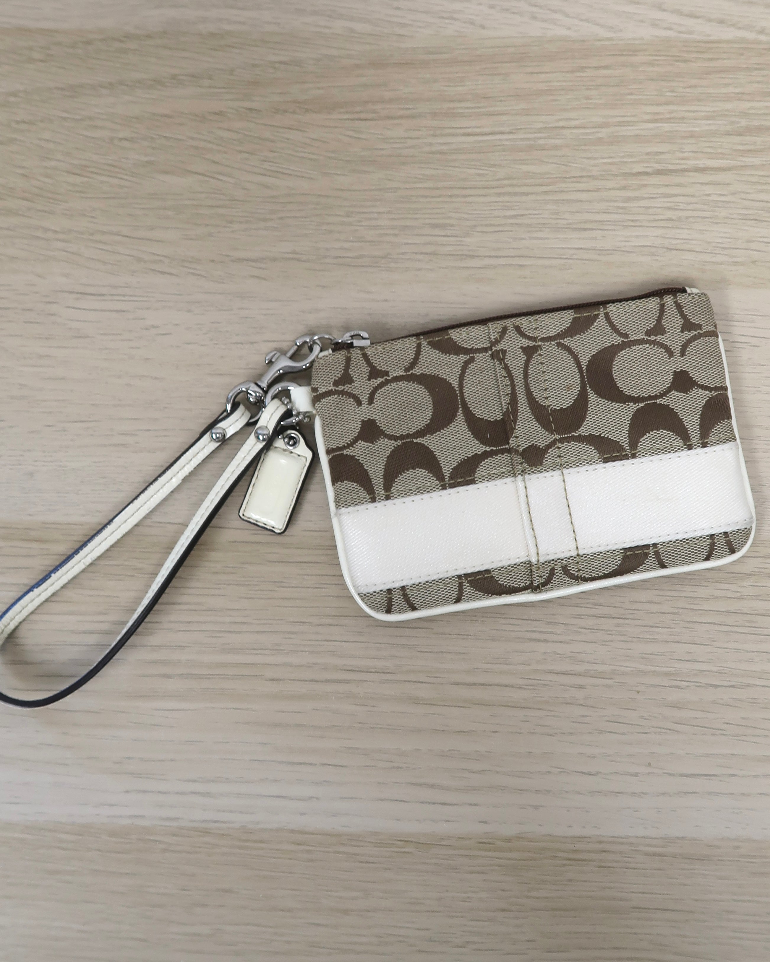 Coach Signature Stripe wristlet