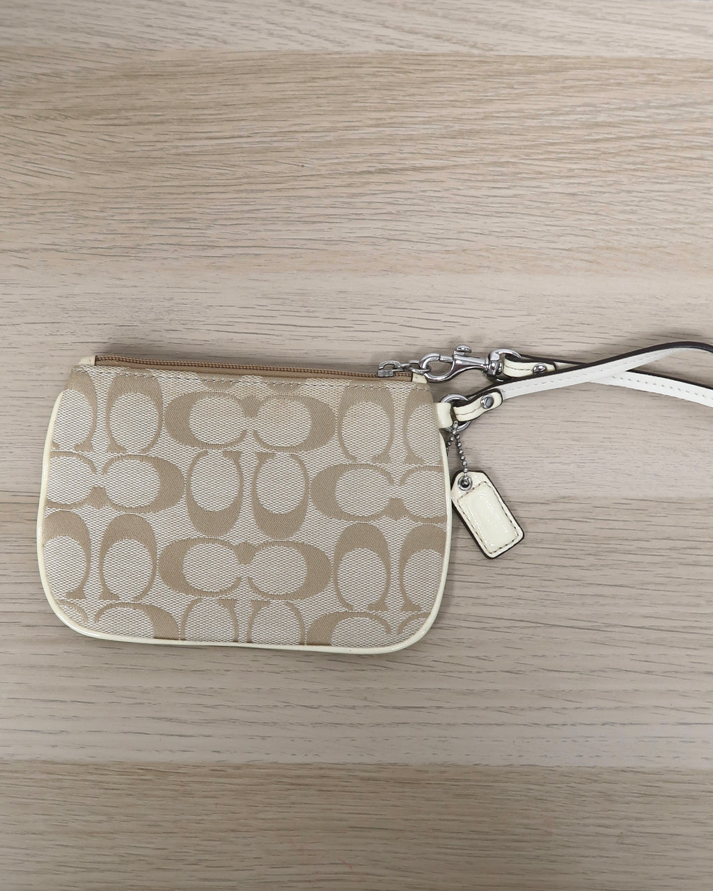 Coach tan signature jacquard canvas small wristlet