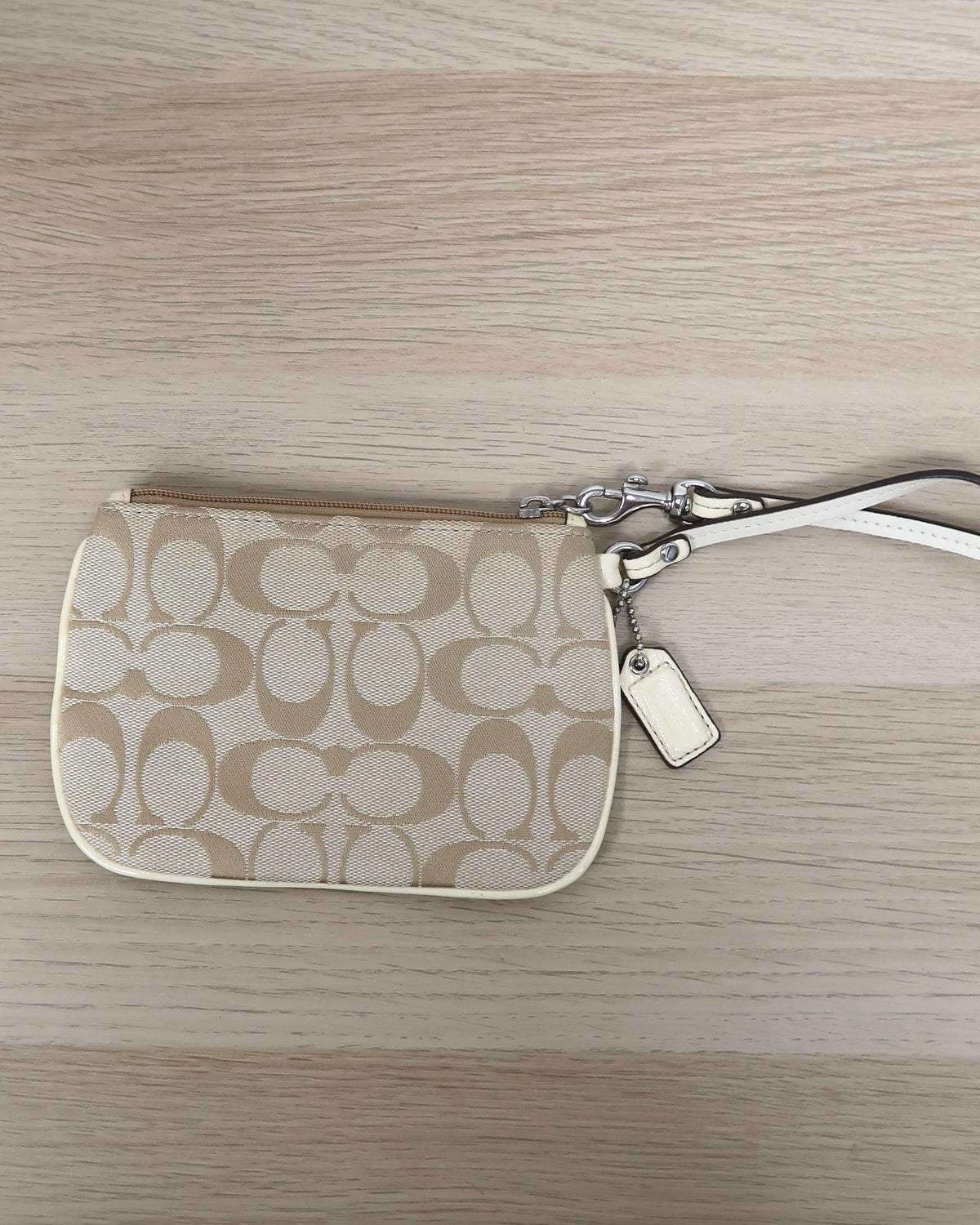 Coach tan signature jacquard canvas small wristlet