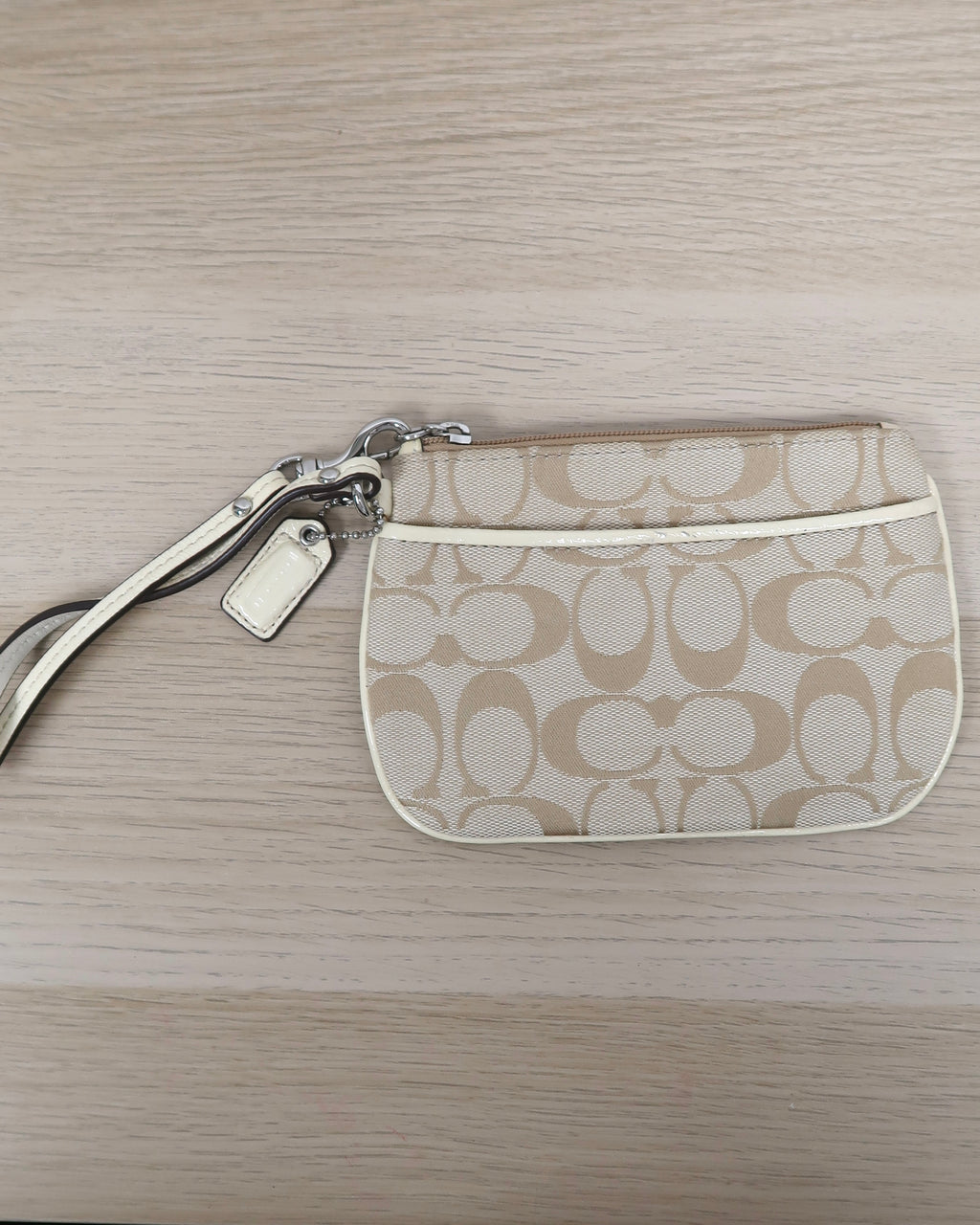 Coach tan signature jacquard canvas small wristlet