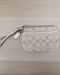 Coach tan signature jacquard canvas small wristlet