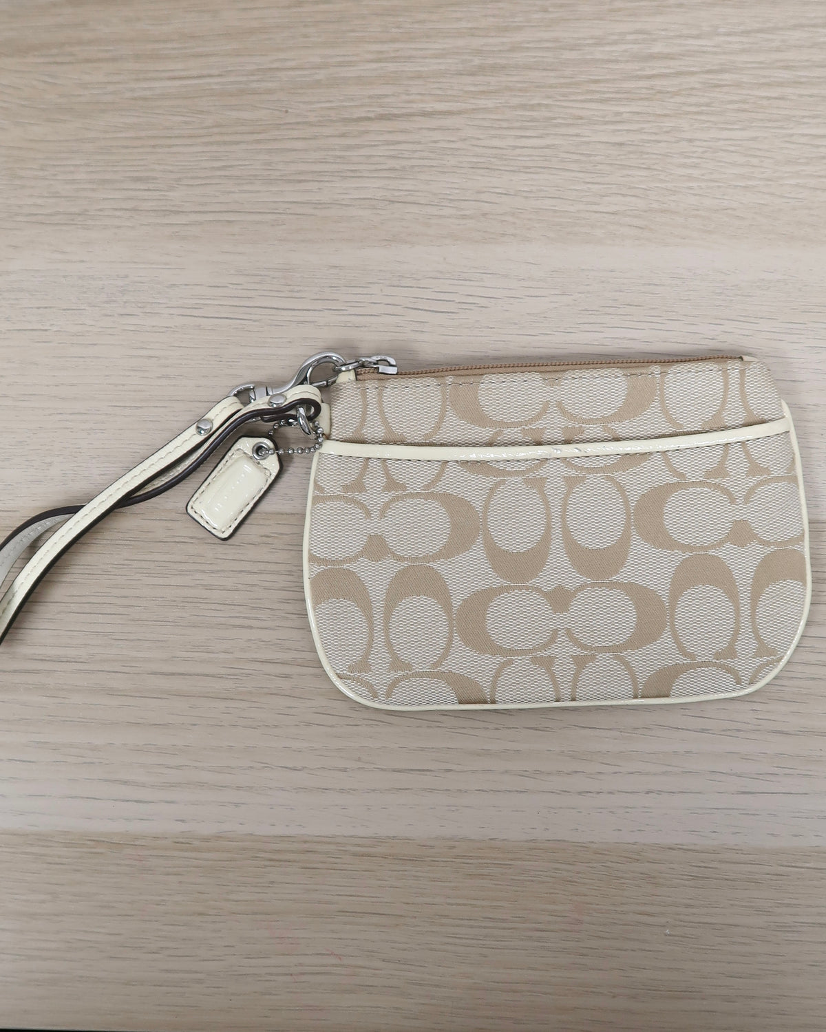 Coach tan signature jacquard canvas small wristlet