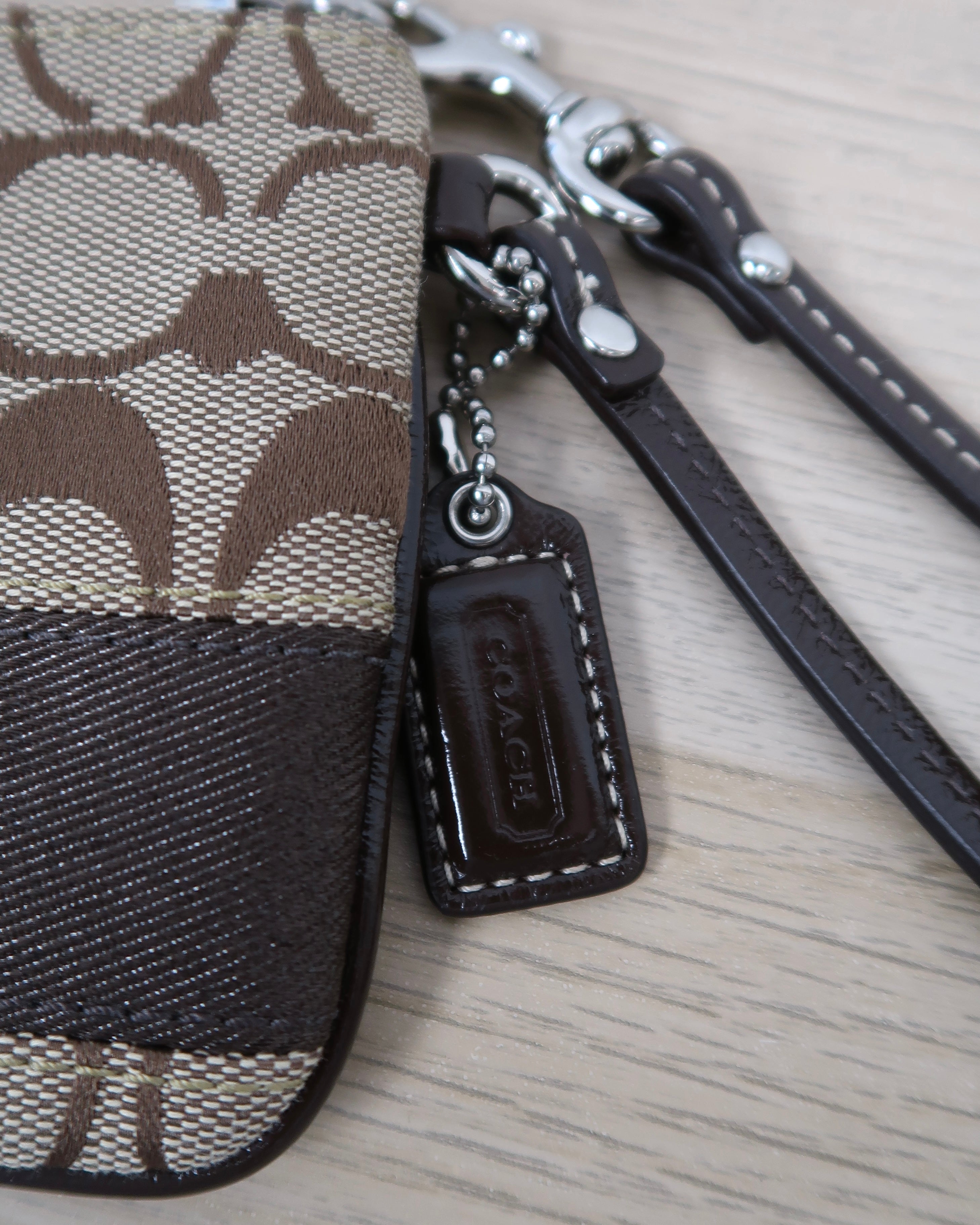Coach signature canvas wristlet