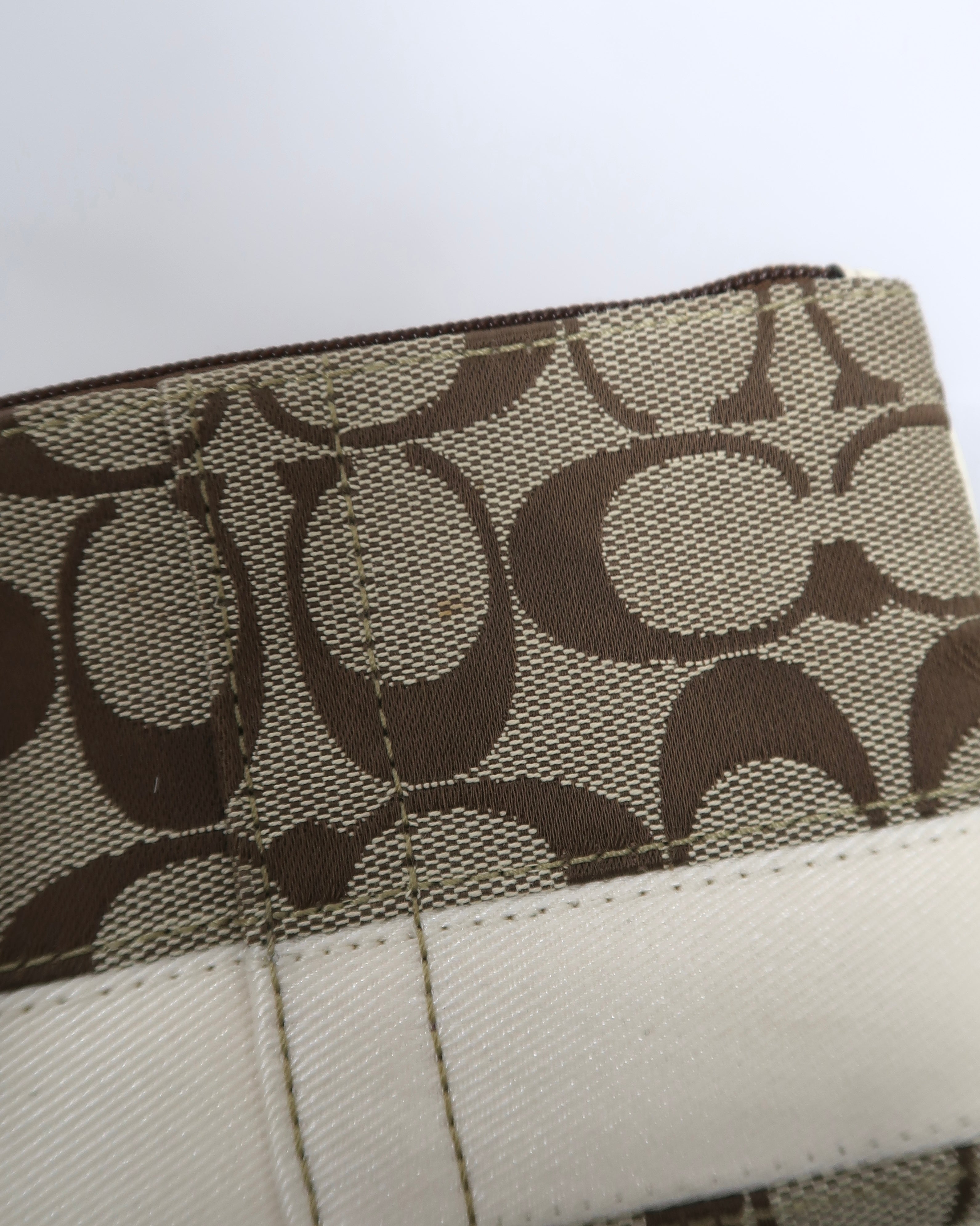 Coach Signature Stripe wristlet