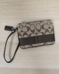 Coach signature canvas wristlet