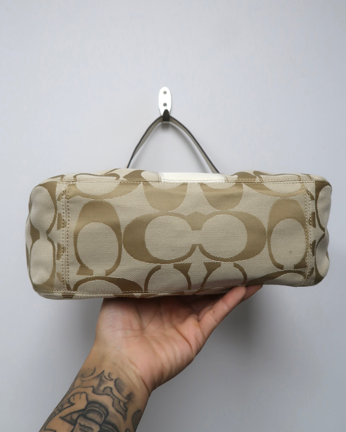 Coach Signature Stripe convertible hobo bag