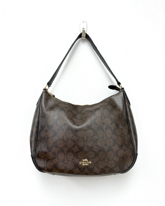 Coach Laurel Shoulder Bag in a dark brown Signature coated canvas with black leather trim and a gold-toned logo