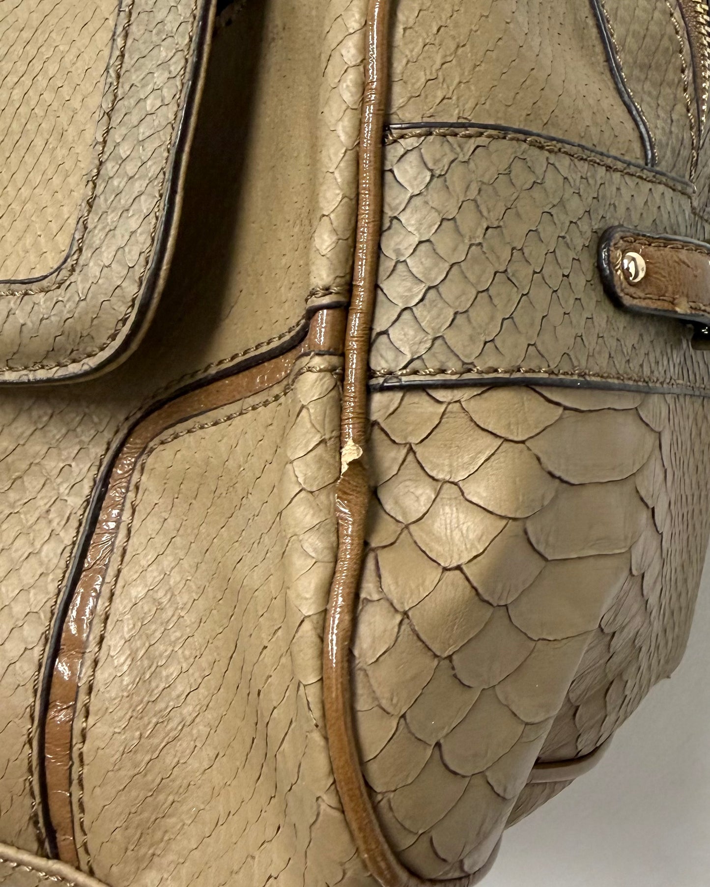 tan snakeskin-textured Guess satchel