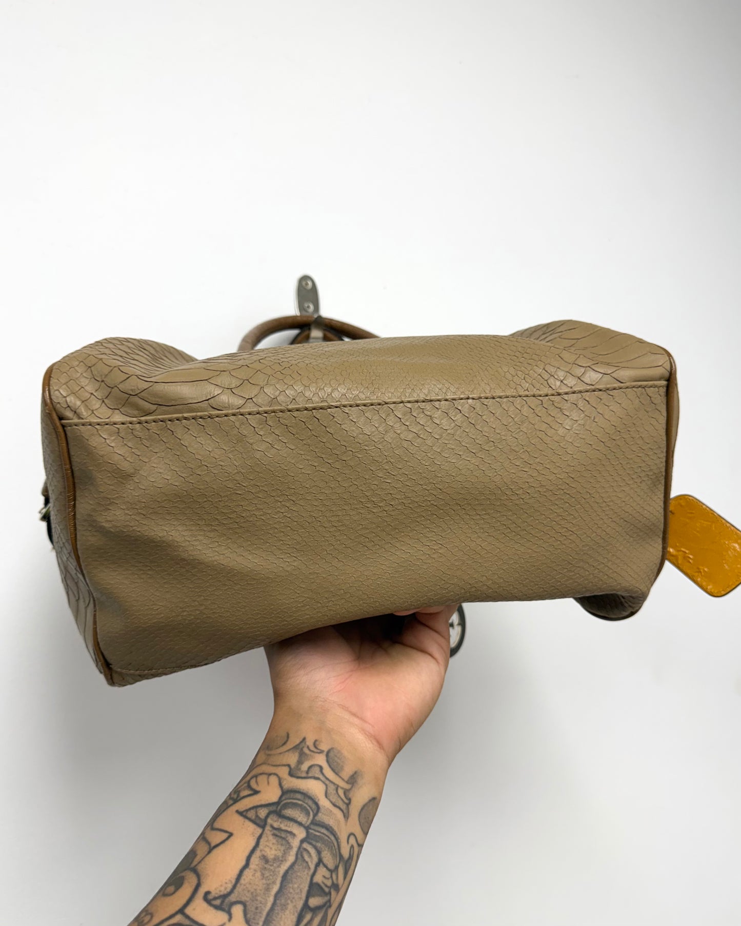 tan snakeskin-textured Guess satchel