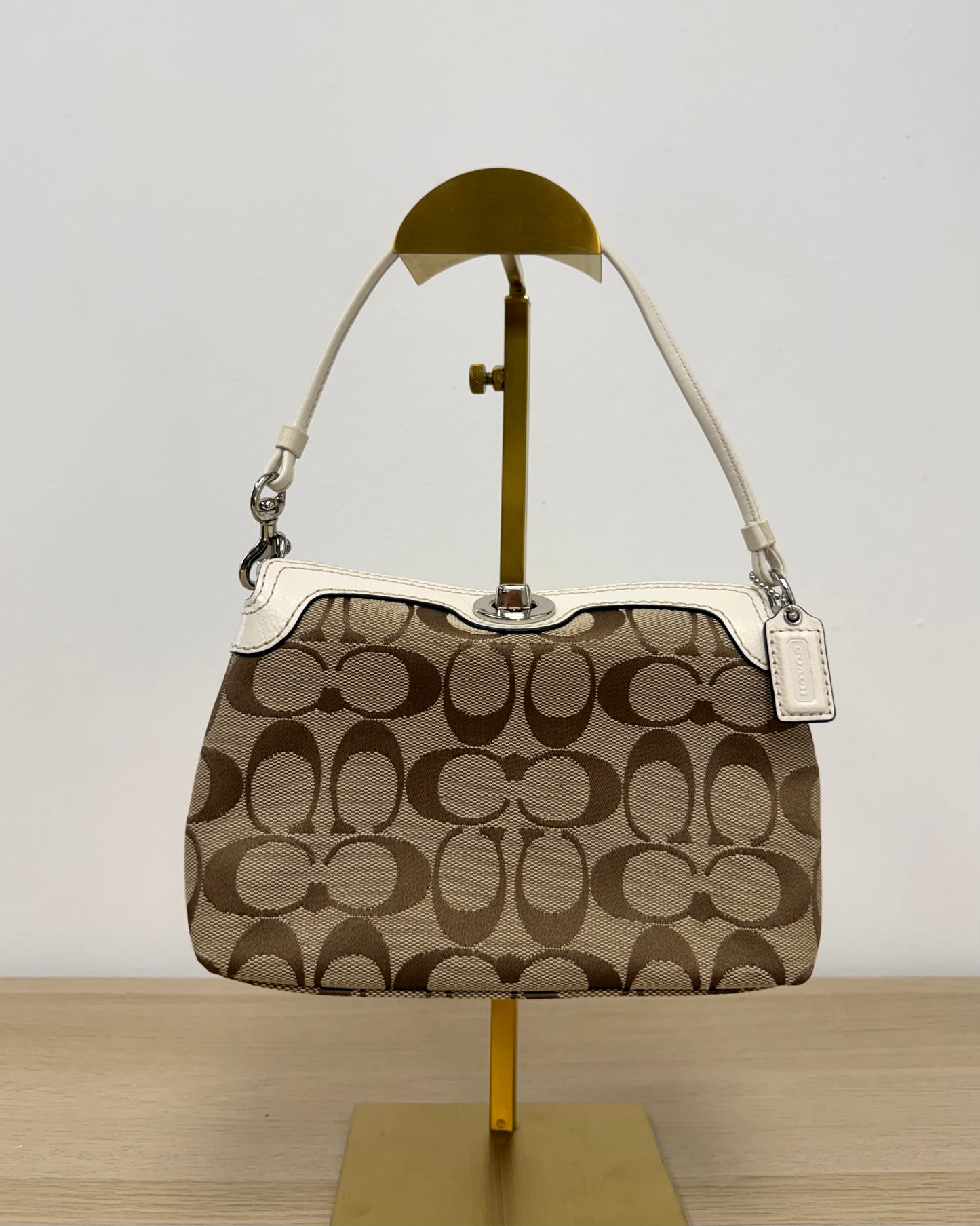 Coach Mini Turn Lock wristlet bag