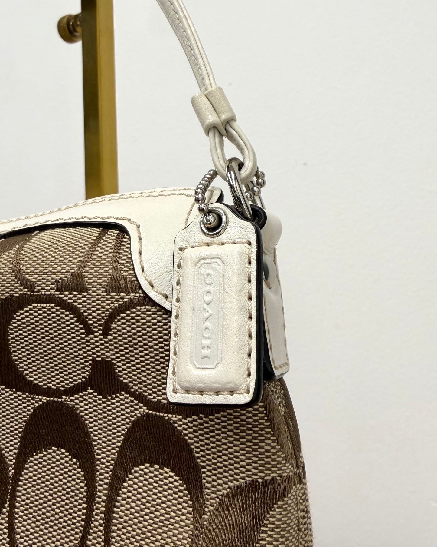 Coach Mini Turn Lock wristlet bag