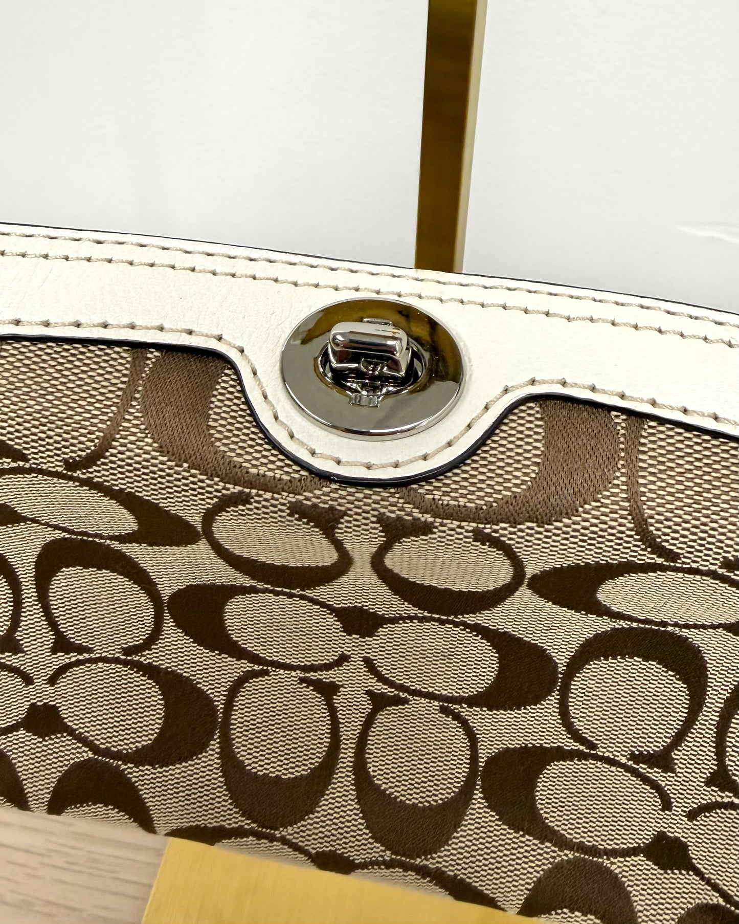 Coach Mini Turn Lock wristlet bag