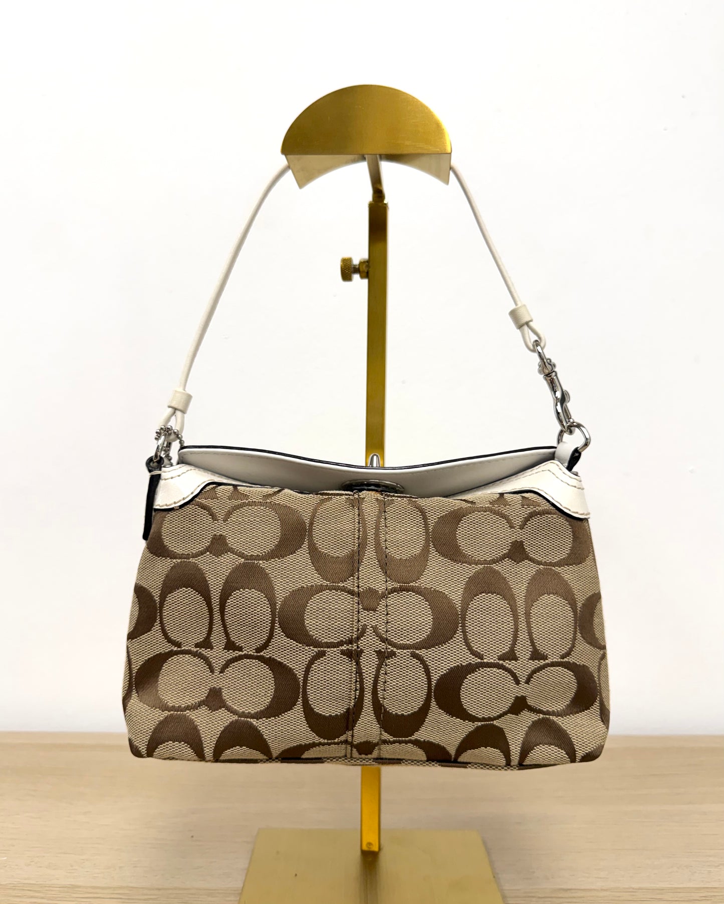 Coach Mini Turn Lock wristlet bag