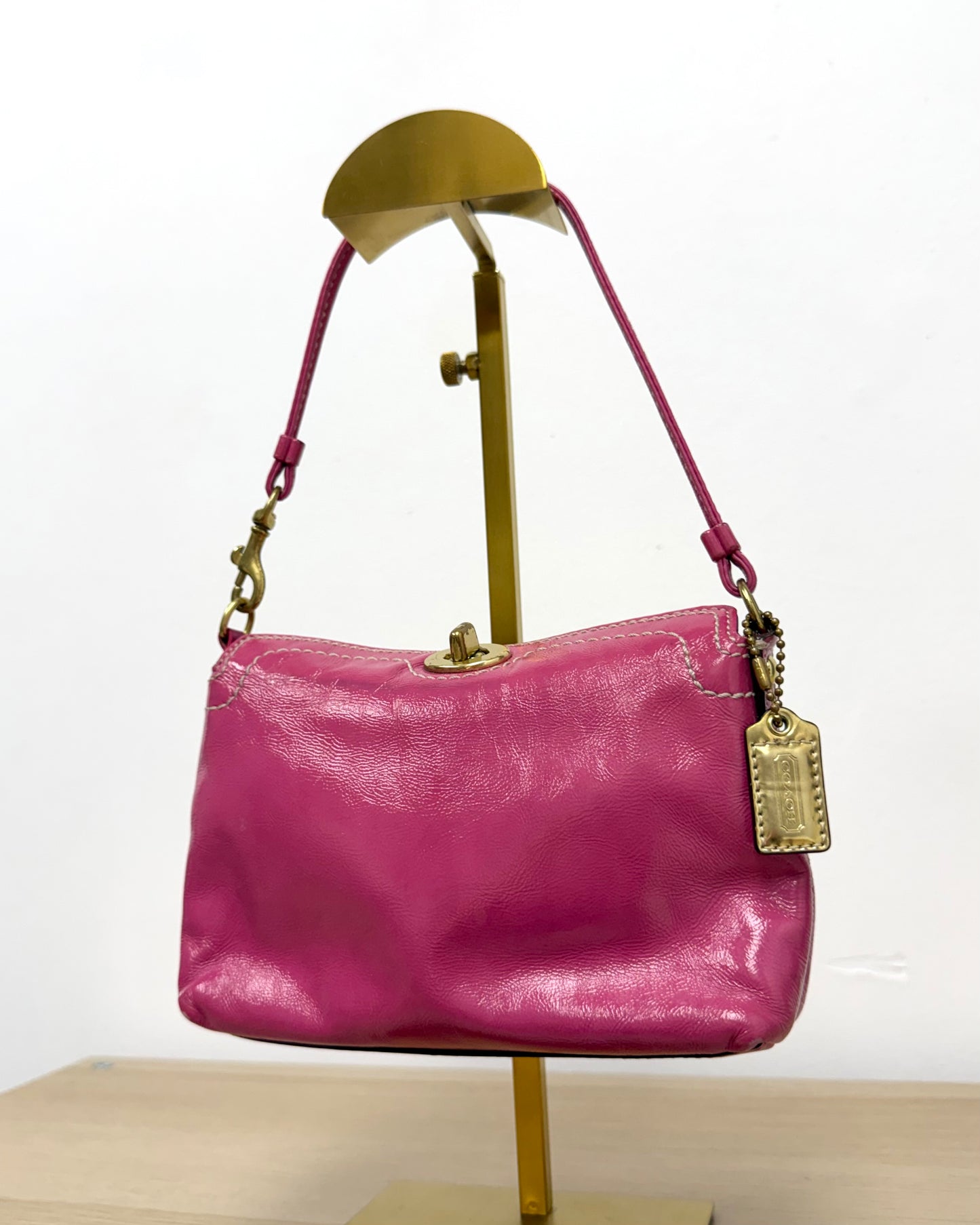 hot pink Coach Chelsea leather wristlet