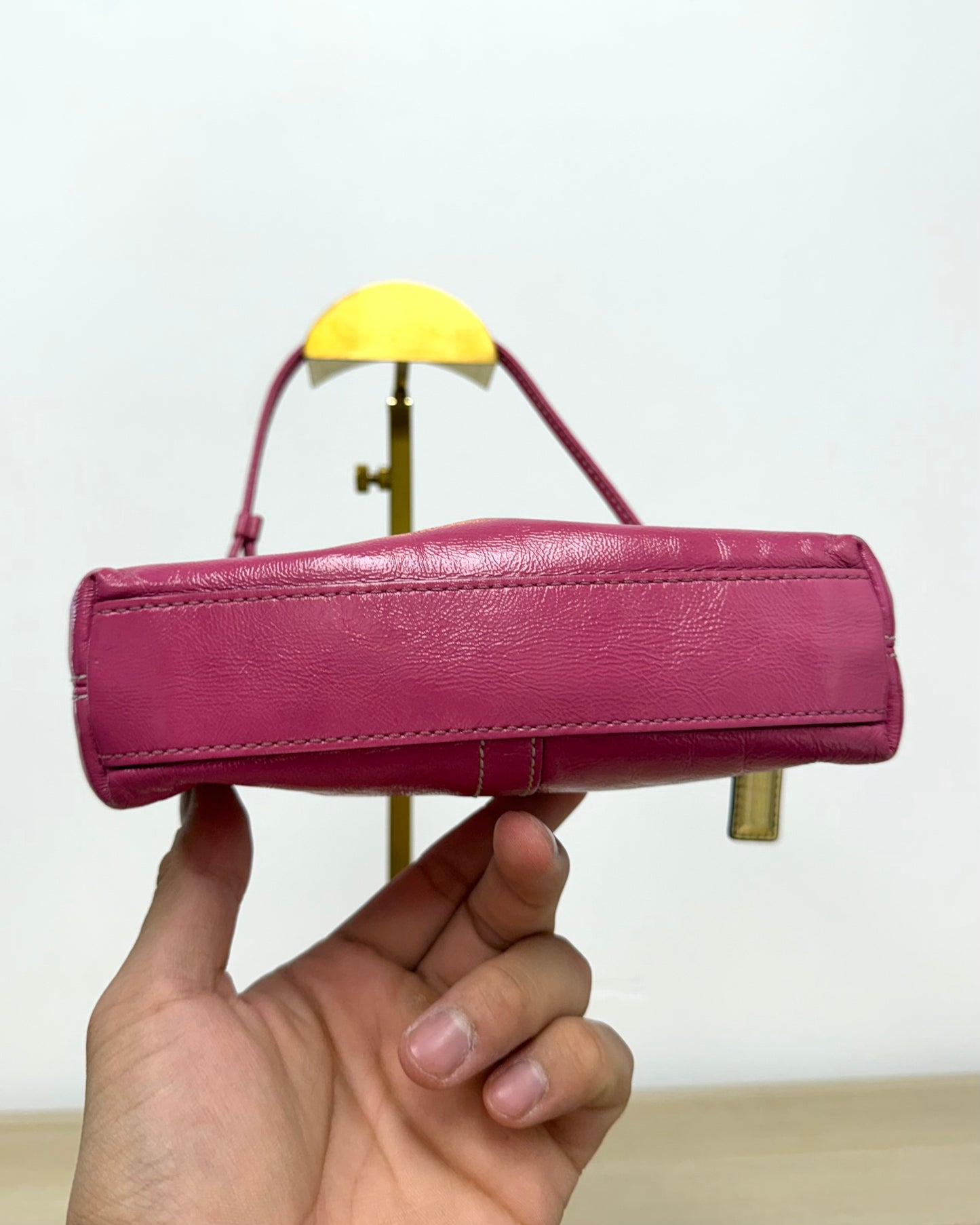 hot pink Coach Chelsea leather wristlet