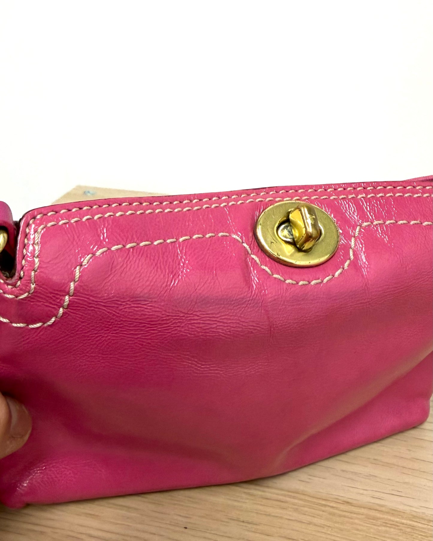 hot pink Coach Chelsea leather wristlet