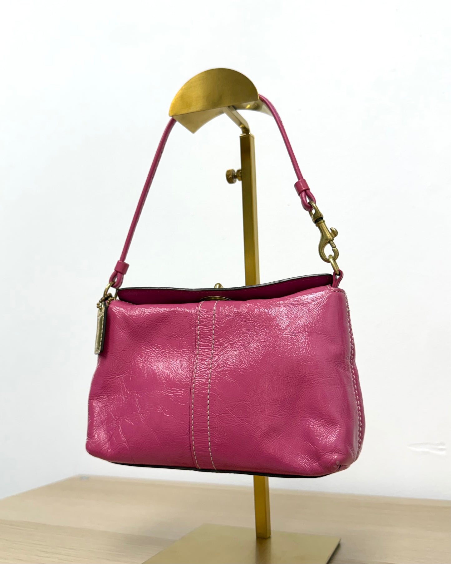 hot pink Coach Chelsea leather wristlet