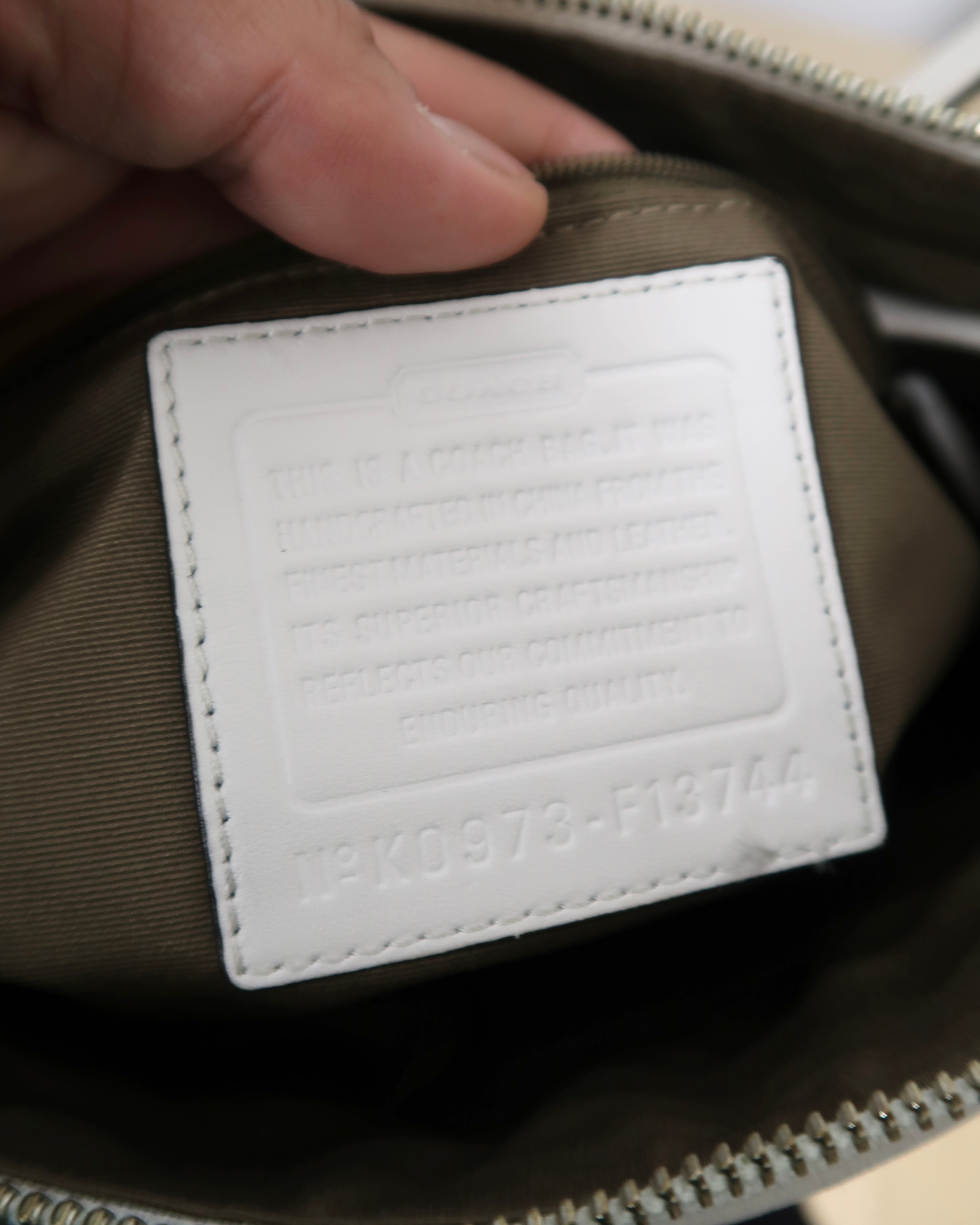 Tan Coach shoulder bag