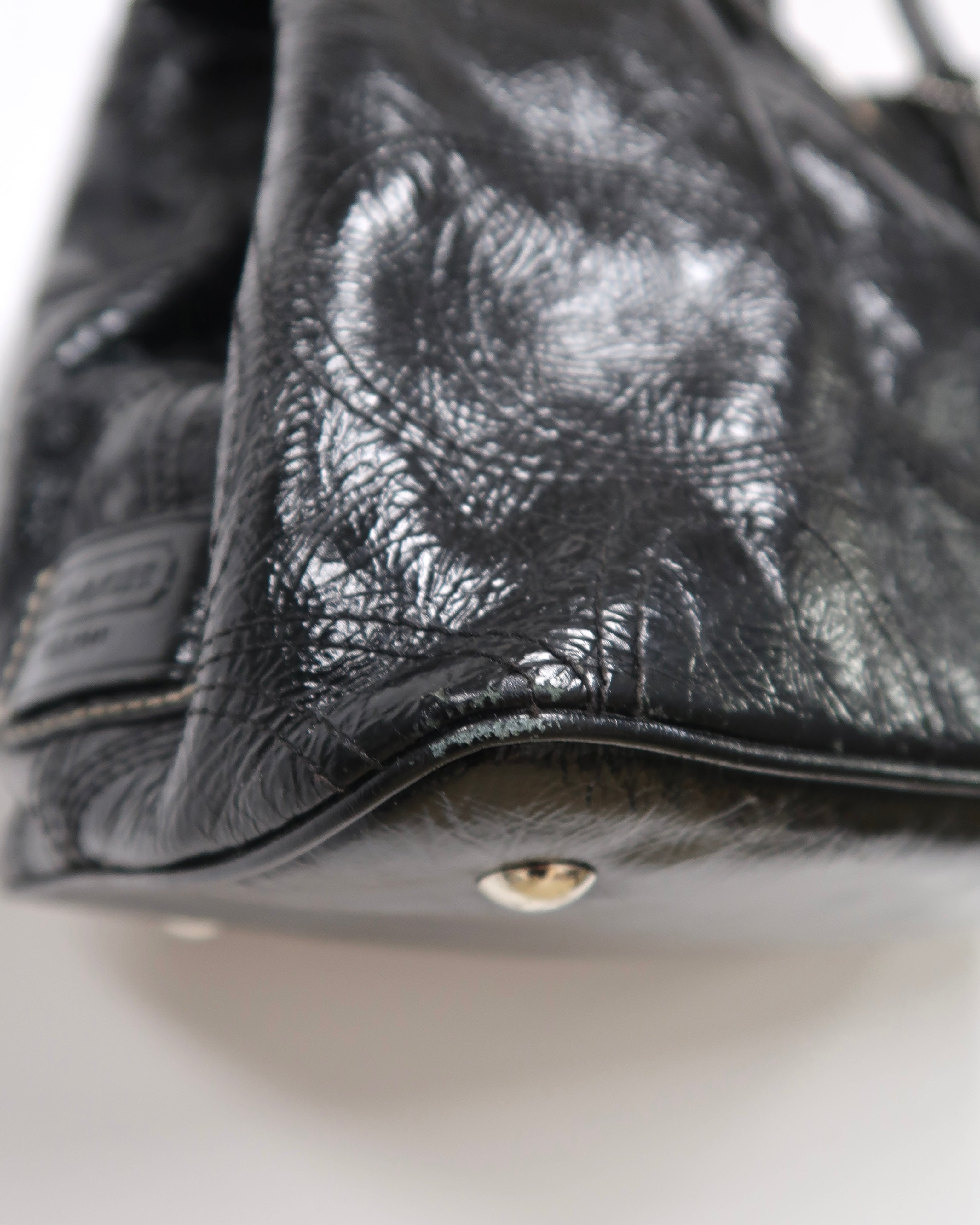 black patent leather Coach Signature Stitch Carryall