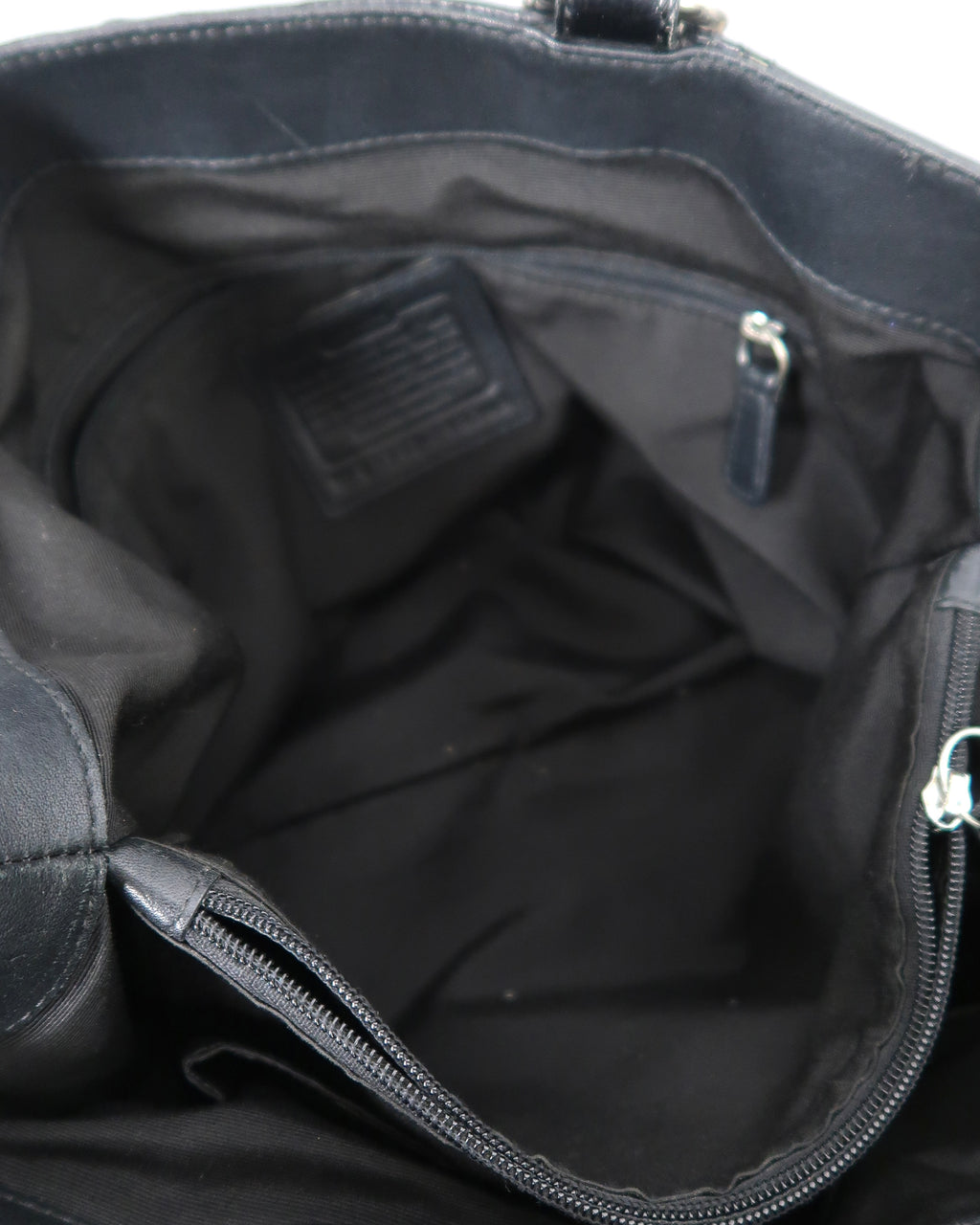 black leather Coach Soho East West shoulder bag