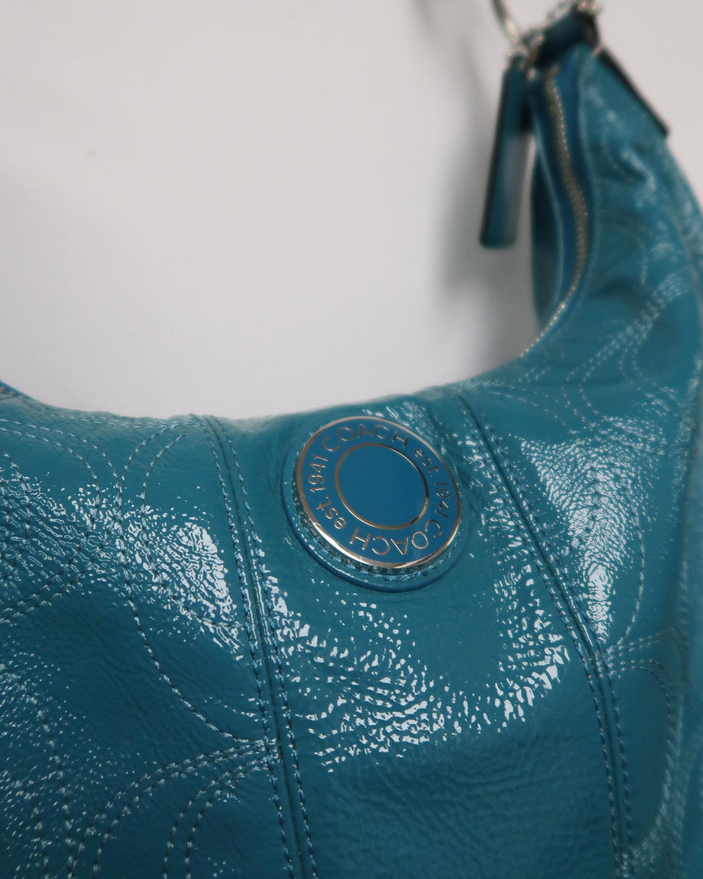 teal Coach Signature Gallery patent leather shoulder bag