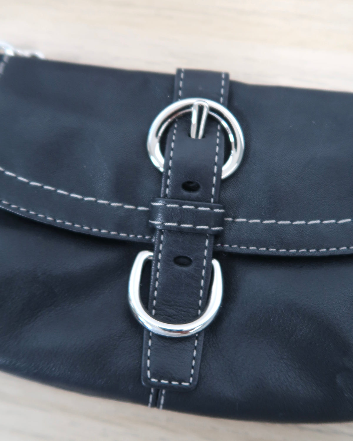 Coach Soho black leather buckle wristlet