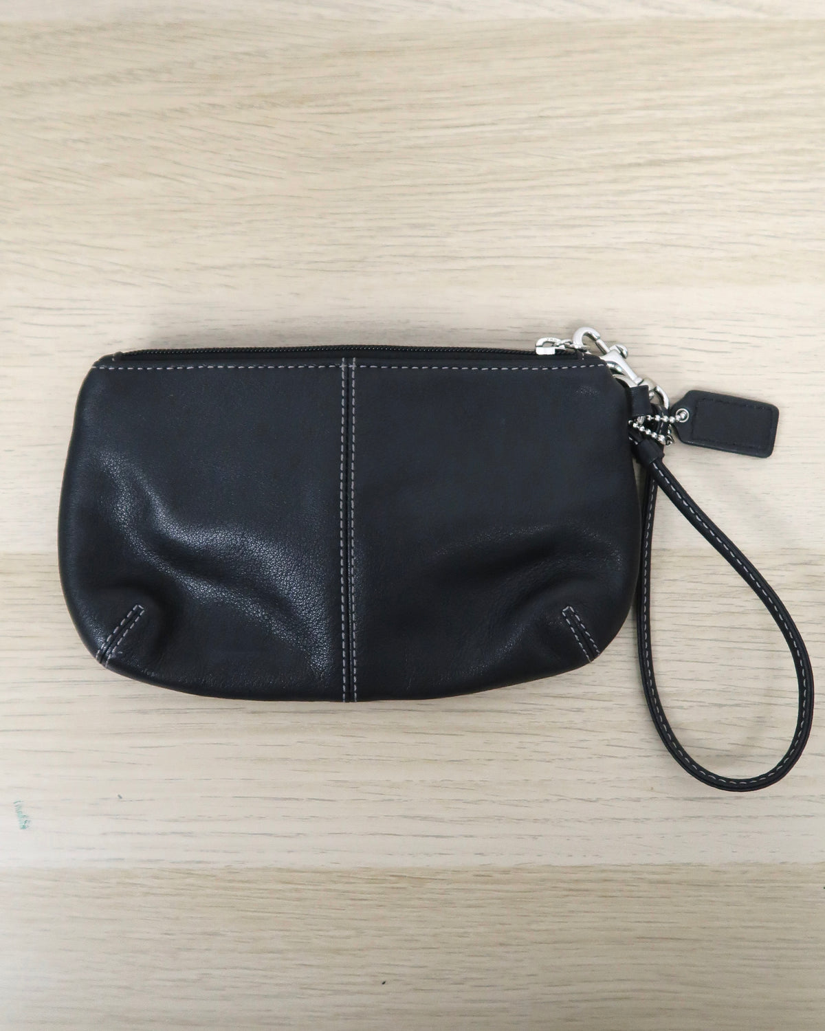 Coach Soho black leather buckle wristlet